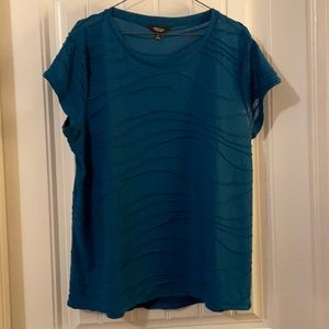 Light weight but not see through top. Gently worn no spots